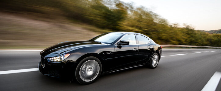 Maserati Ghibli is new model. Speed is about 120km/h Shoot in motion from another car, on highway in Serbia, Belgrade.