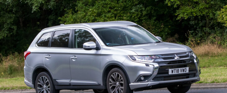 Milton Keynes,UK - July 21st 2023: 2018 silver Mitsubishi Outlander car driving on an English road