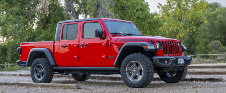 Fort Collins, CO, USA - October 2, 2024: A new Jeep Gladiator pick up, Rubicon model at a trailhead parking.
